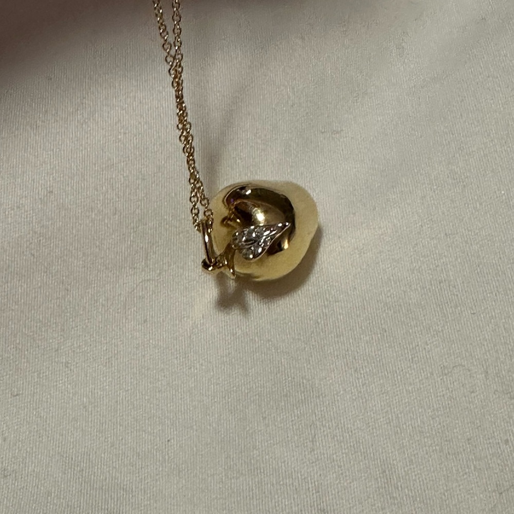 Tiffany & Co. gold apple pendant necklace